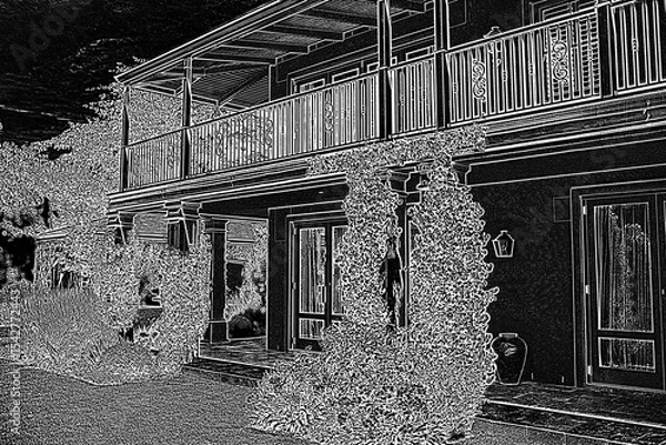 Fototapeta Pretty house with balcony and with a black and white filter