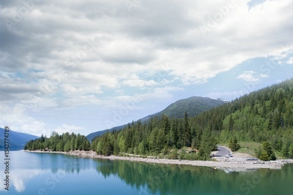 Obraz Trees reflecting in calm lake against sky
