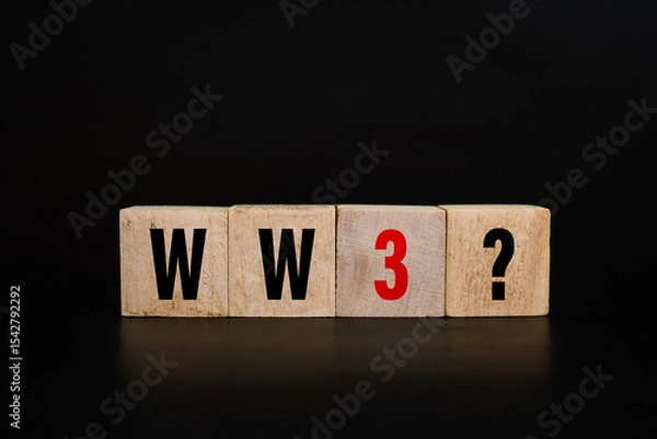 Fototapeta world war 3 with question mark on wooden blocks isolated on dark background