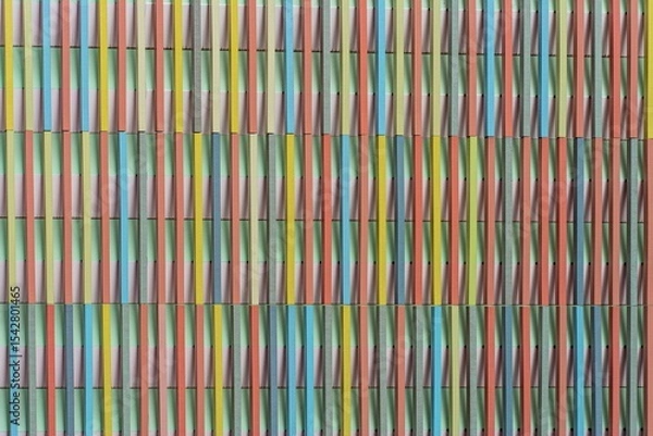 Obraz Colorful ceramic wall with vertical stripes forming abstract architectural texture