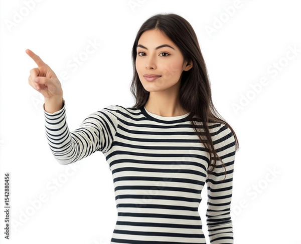 Fototapeta Smiling Woman in Striped Shirt Pointing Up – Studio Portrait with White Background, Perfect for Advertising, Branding, or Marketing Campaigns