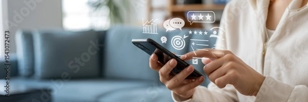 Fototapeta Person using a smartphone with customer feedback interface.