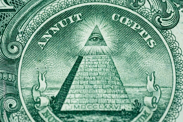 Fototapeta Macro of One US Dollar bill pyramid all seeing eye front side of American currency straight 1