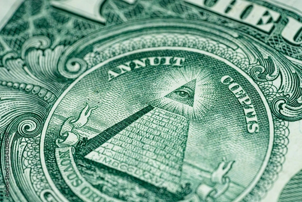 Obraz Macro of One US Dollar bill pyramid all seeing eye front side of American currency tilted 2