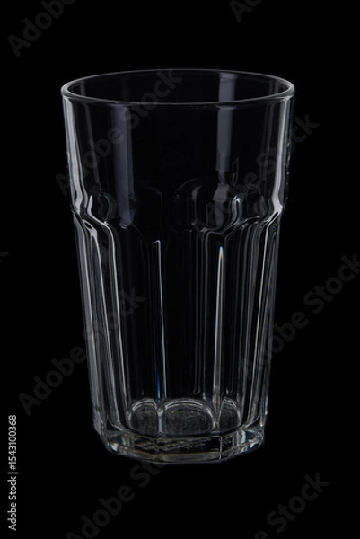 Obraz Empty tall glass on black background