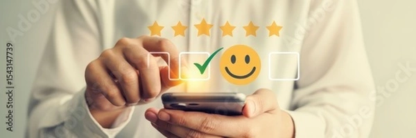 Fototapeta A person giving a positive review on a mobile device.