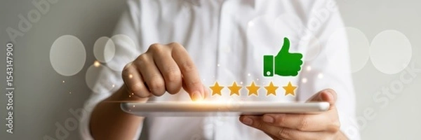 Fototapeta Person giving a positive review on a digital device.