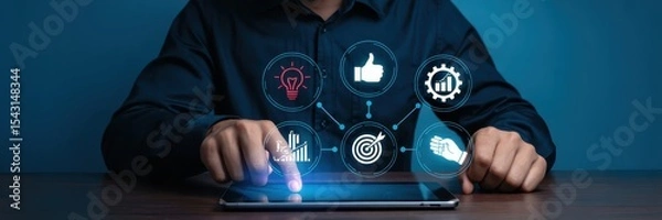 Fototapeta Person interacting with a digital tablet displaying business icons.