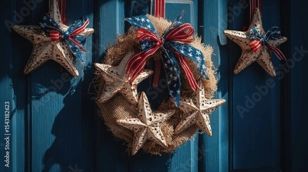 Fototapeta A beautiful DIY holiday wreath made of burlap and decorated with starfish and ribbons.