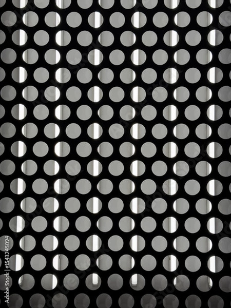 Fototapeta Abstract Pattern of Perforated Metal with Light and Shadow