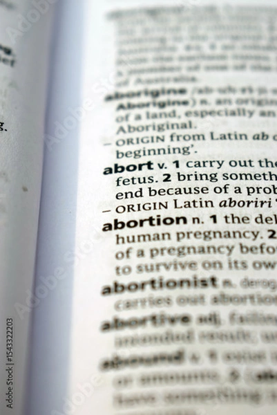 Fototapeta Close Up Of English Dictionary Page With Word - Abort