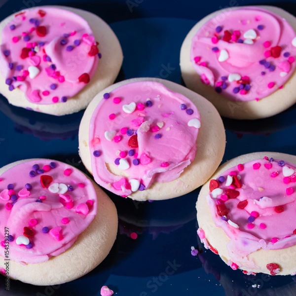 Fototapeta Five large cookies in an X shape or composition.