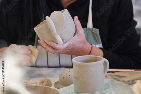 Obraz Shape clay with hands