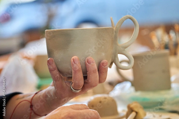 Fototapeta Shape clay with hands
