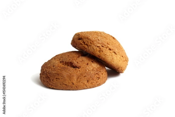 Obraz Fresh oatmeal cookies lie on a white background.	