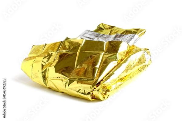 Obraz On a white isolated background lies foil for keeping warm in a critical situation.