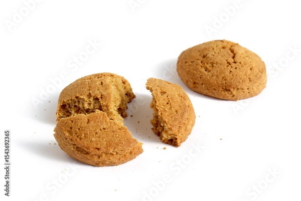 Obraz Pieces of fresh oatmeal cookies lie on a white background.	