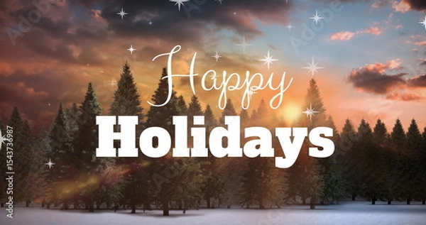 Obraz Displaying white Happy Holidays text floating over snowy pine forest at sunset, with star sparkles