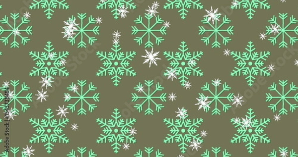 Fototapeta Displaying repeating mint green snowflake motifs and smaller white snowflakes on olive green fabric