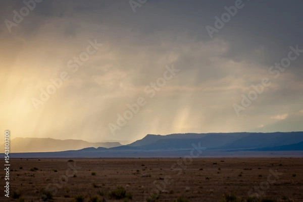 Obraz storm clouds over the mountains
