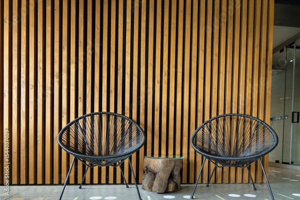 Fototapeta Two chairs standing next to each other in a spa salon.