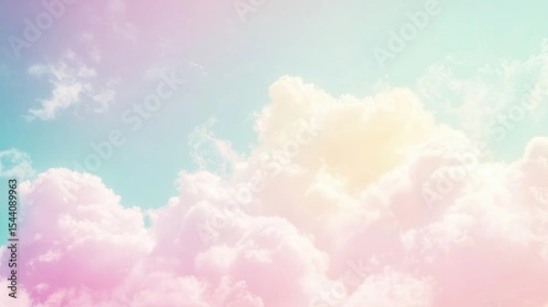 Fototapeta Pastel colored sky with fluffy clouds.