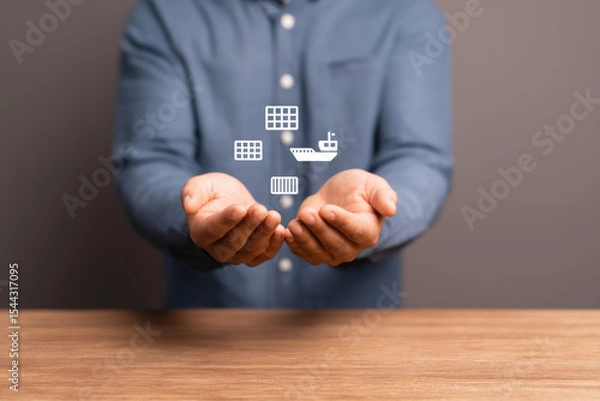 Obraz Man hands with floating shipping delivery icons logistics cargo supply chain business technology innovation wooden table