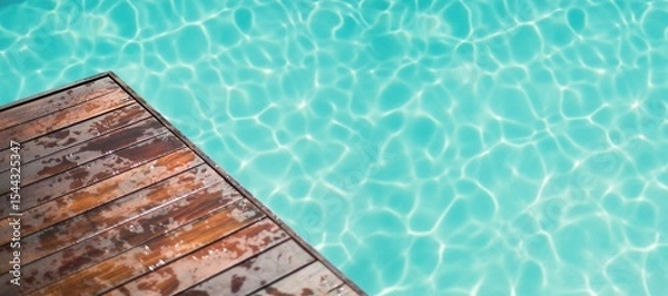 Obraz High angle view of pier by swimming pool