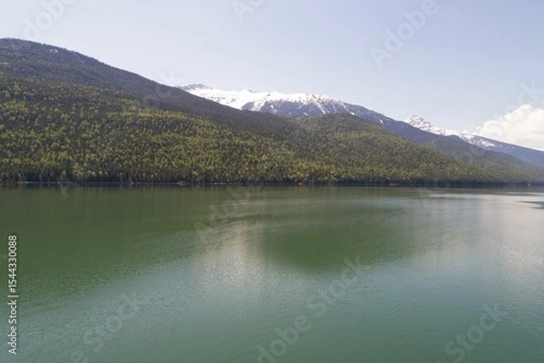 Obraz River and mountains against sky