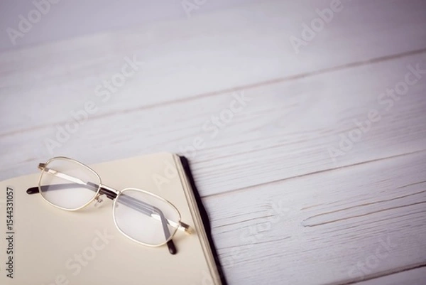 Obraz High angle view of golden eyeglasses