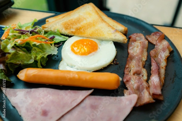 Obraz Eggs cooked in a pan