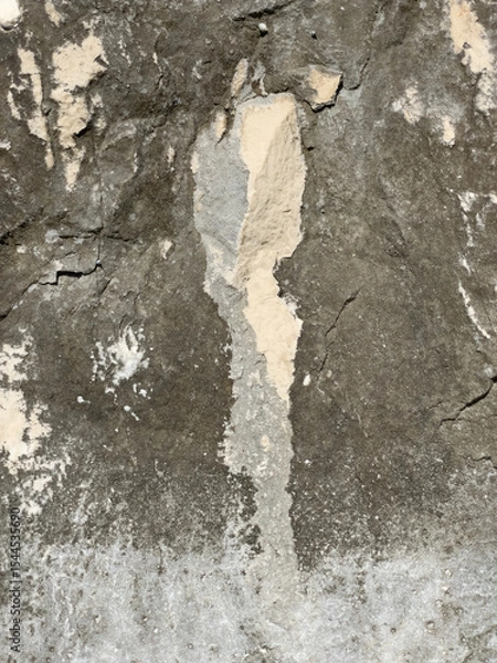 Fototapeta Vertical cracked stone surface texture