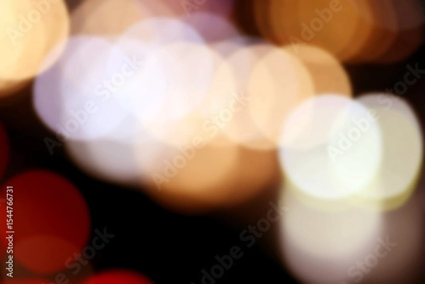 Obraz Abstract Bokeh of Urban Lights: A mesmerizing array of soft, blurred light circles floats in a dark background, evoking a sense of mystery and allure in this abstract photographic artwork.