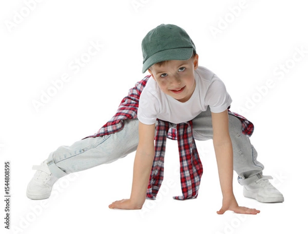 Obraz Happy little boy in baseball hat dancing on white background