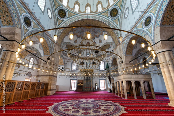 Fototapeta Intricate patterns and vibrant colors fill the interior of Selimiye Camii, a beautiful iconic mosque in Konya, Turkey, with its grand arches and ornate details