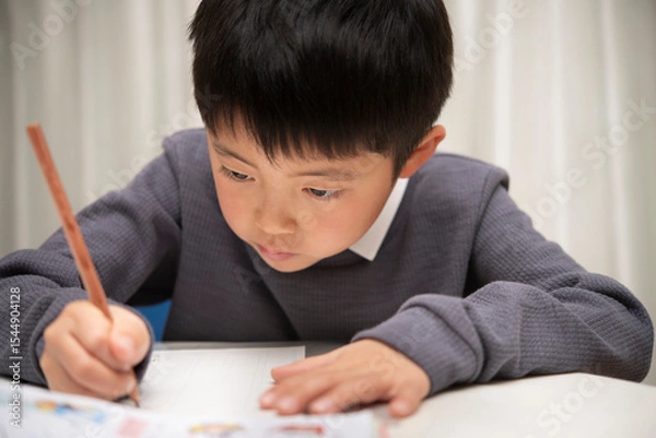 Fototapeta 勉強する子供