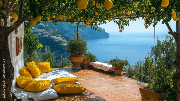 Fototapeta A beautiful view of the ocean with a lemon tree in the background. The lemon tree is covered in lemons and the view is serene and peaceful