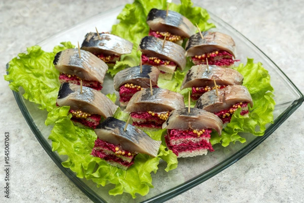 Obraz Scandinavian sandwiches with herring and beetroot