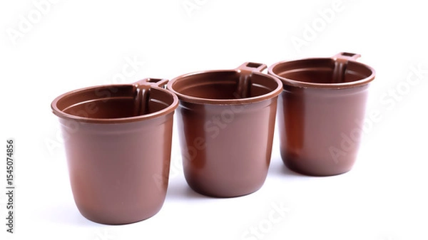 Obraz Brown plastic cups isolated on white background