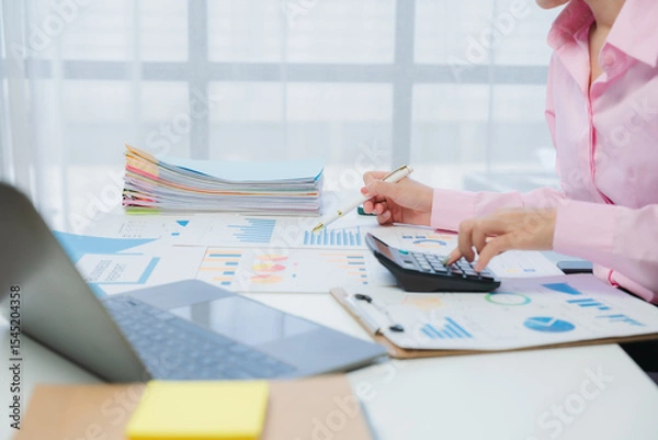 Obraz Financial Analysis with Charts and Calculator