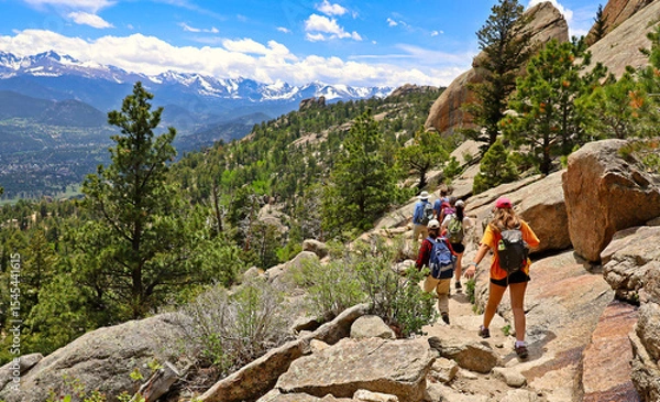 Fototapeta Hikers descending the Gem Lake Trail in Rocky Mountain National Park, Colorado