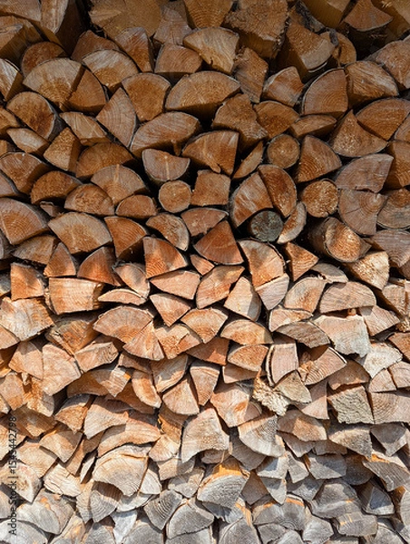 Fototapeta Cross-section background of a large number of firewood piles