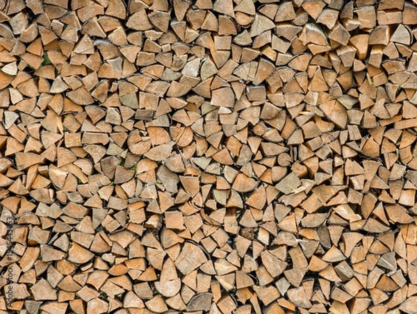Fototapeta Cross-section background of a large number of firewood piles