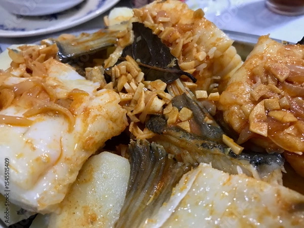 Obraz Codfish with Garlic, Paprika, and Fresh Herbs