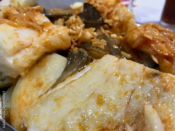 Obraz Codfish with Garlic, Paprika, and Fresh Herbs