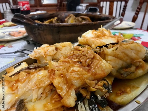 Obraz Codfish with Garlic, Paprika, and Fresh Herbs