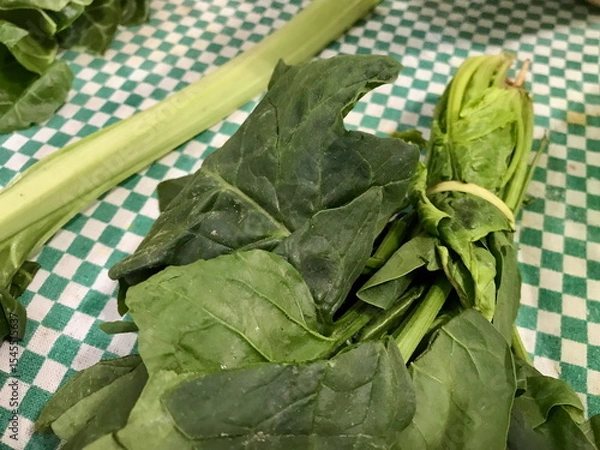 Obraz Fresh Chard Being Prepared on Green Tablecloth