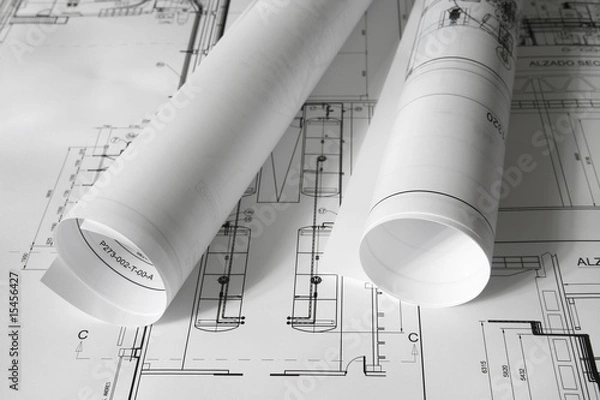 Obraz Rolled plans on the table