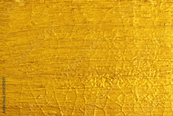 Obraz gold paint brushed on concrete wall texture background.