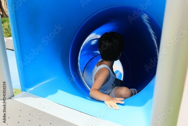 Fototapeta Child on slide.